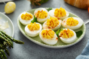 Receta de Huevos Rellenos Gratinados con Jamón y Queso