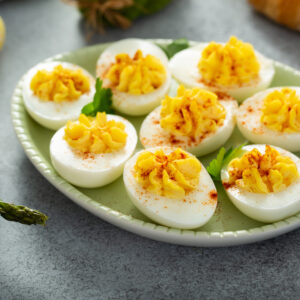 Receta de Huevos Rellenos Gratinados con Jamón y Queso